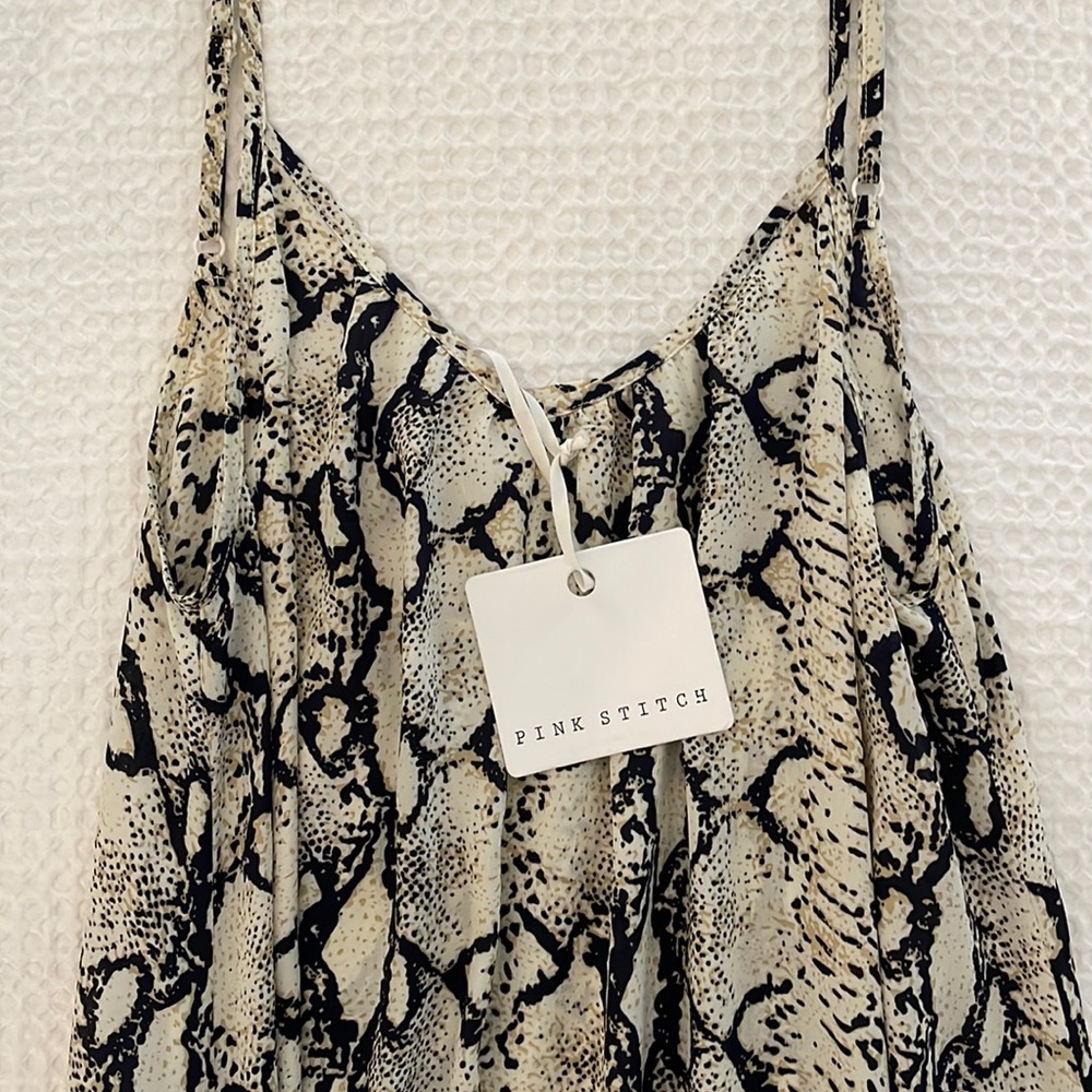 Pink stitch woman’s high-low snake print dress: size 4